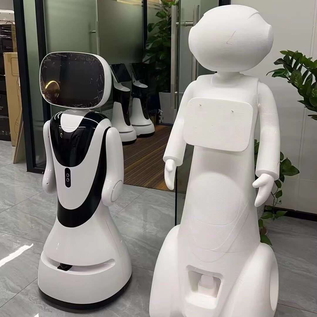 Service robot with a chest screen standing in a showroom